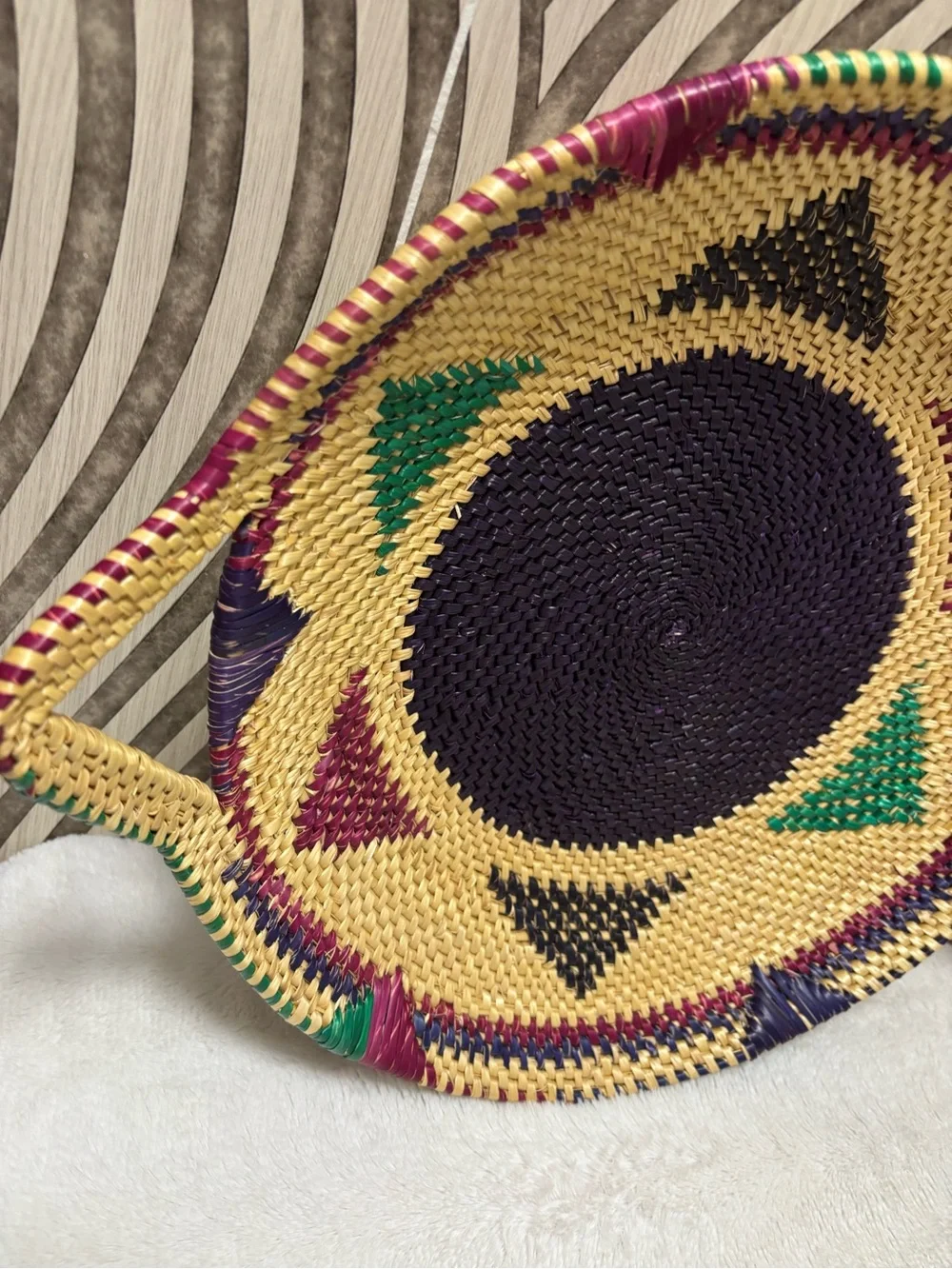 African hand woven colorful wall basket with handles